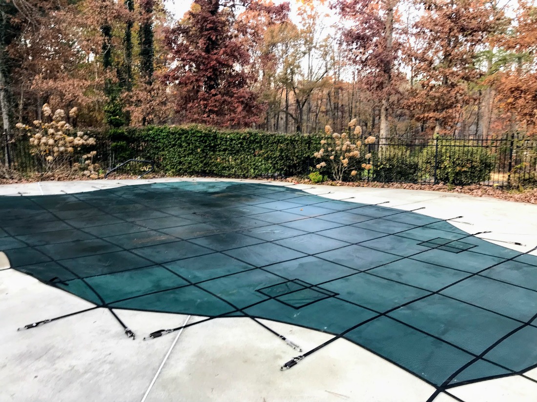 An Inground Swimming Pool Cover: Take a Break from Pool Ownership